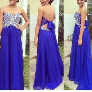 Blue bejeweled prom dress